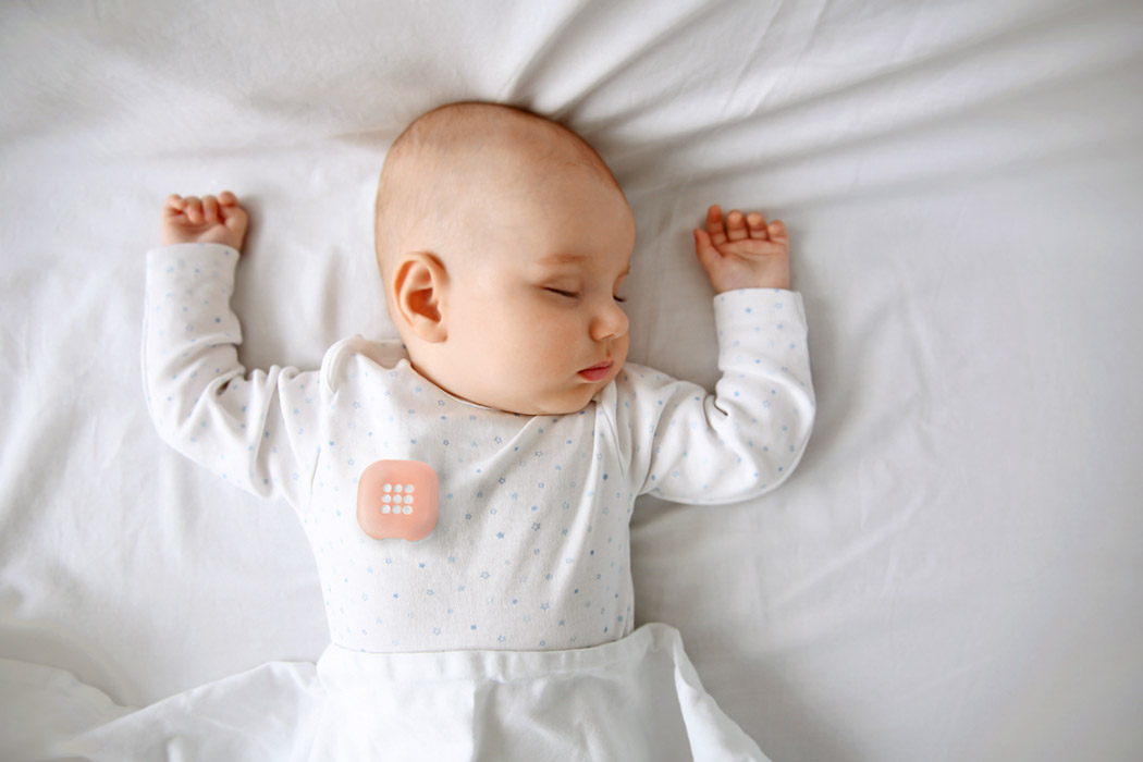 Beautiful sleeping baby in bed