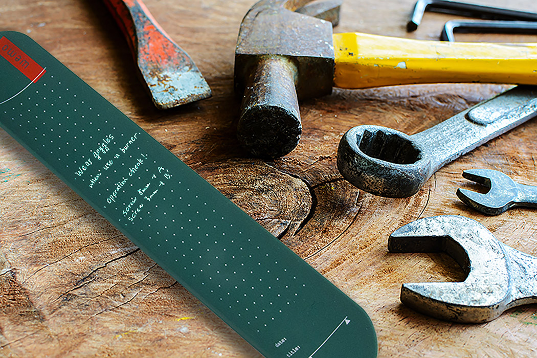 Close up of rusty hammer and tools on old grunge wood background