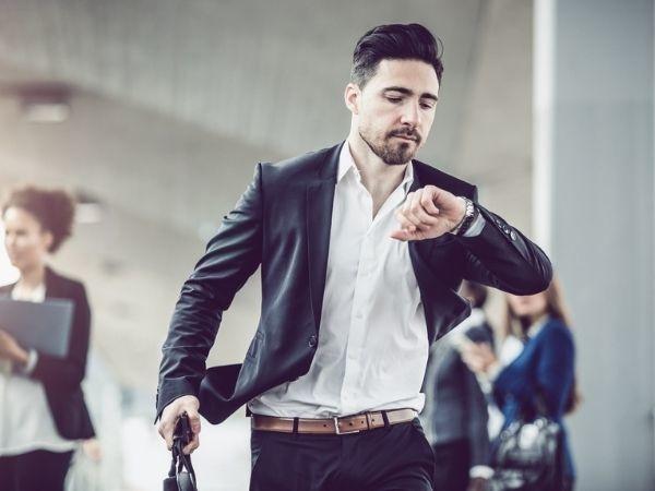 Businessman checking the time