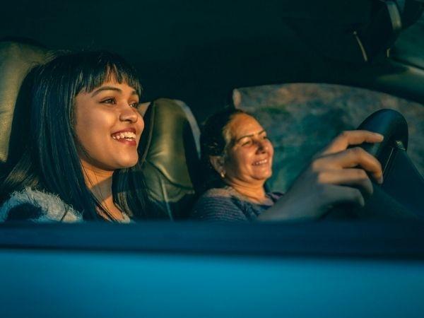 Mother daughter driving 