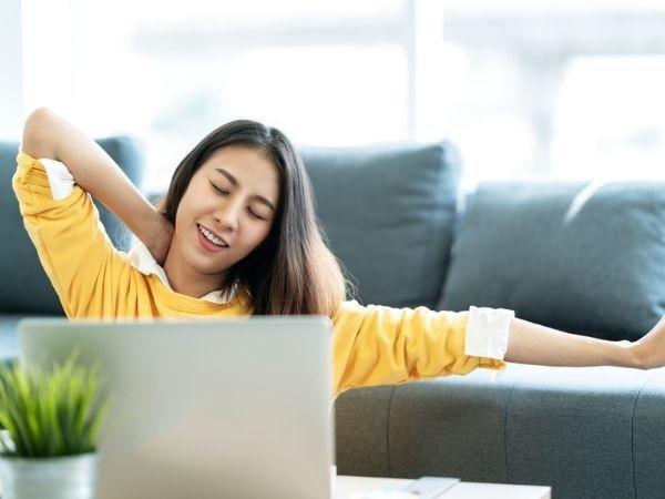 Girl stretching in office 