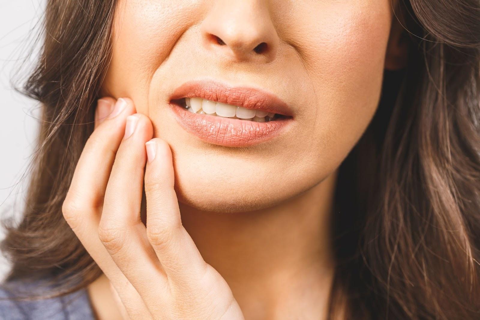 Woman suffering from toothache