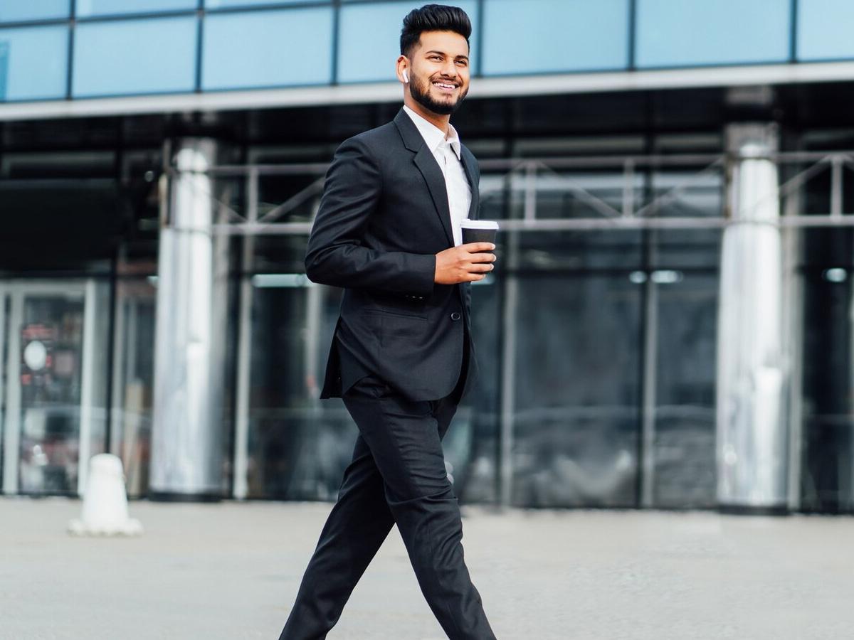 Man walking towards an office