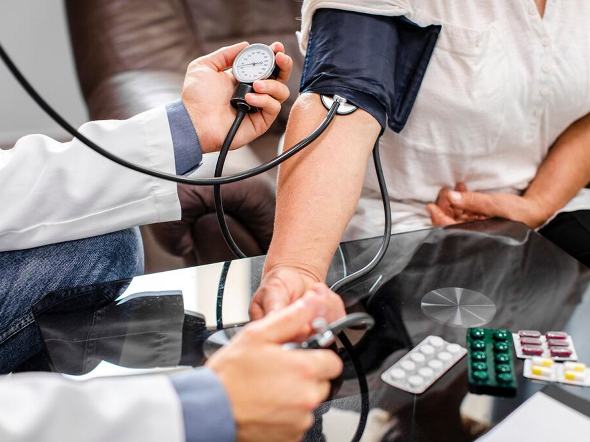 Woman checking blood pressure