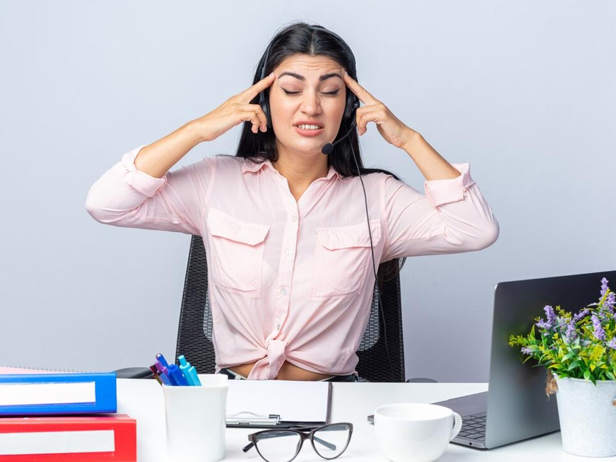 Woman stressed out at work