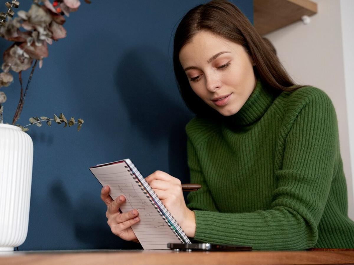  Woman writing a note,