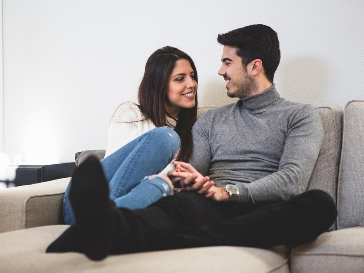 Couple sitting and talking, 